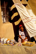 New Mexico: Acoma Pueblo, potter in her 80’s with her wares