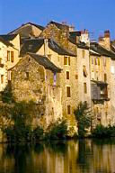 France: Aveyron, Espalion, buildings along Lot River.