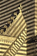Italy: Umbria, Orvieto, duomo (cathedral), detail of striped north façade
