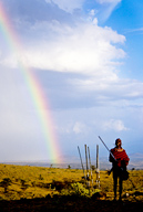 Maasai man and rainbow, Amboseli NP