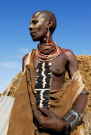 Portrait of woman with porcupine necklace in a Karo tribal village, 