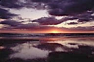 Costa Rica: Playa Grande, sunset over Pacific Ocean, December