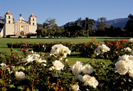 California: Mission Santa Barbara with rose garden in foreground, June