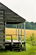 Missouri: Frohna, Saxon Lutheran Memorial, porch of 1848 log cabin, July