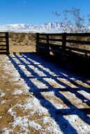 Cattle pen, snowcapped Providence Mountains in background, Mohave Nat’l Preserve, CA, January